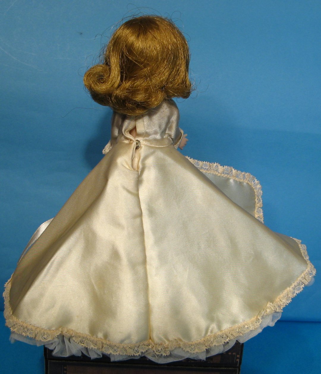 Bisque doll dressed in handmade clothes, 1890-1900